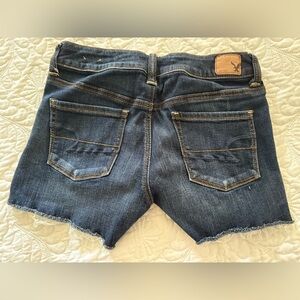 American Eagle Outfitters Blue Distressed cut off shorts size 4 super stretch